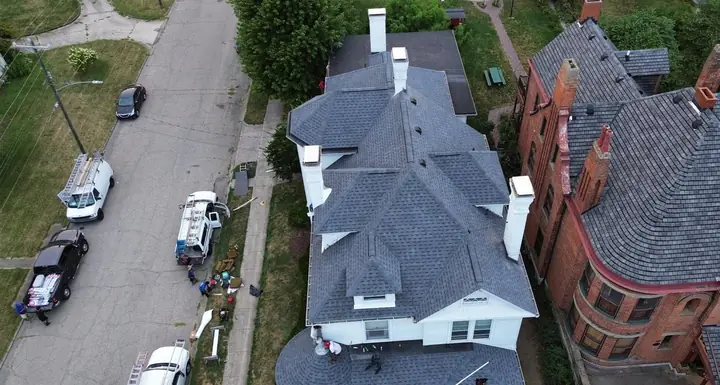 After: the same historic home with a complete new architectural shingle roof